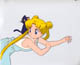 Usagi leaning across something with Luna next to her